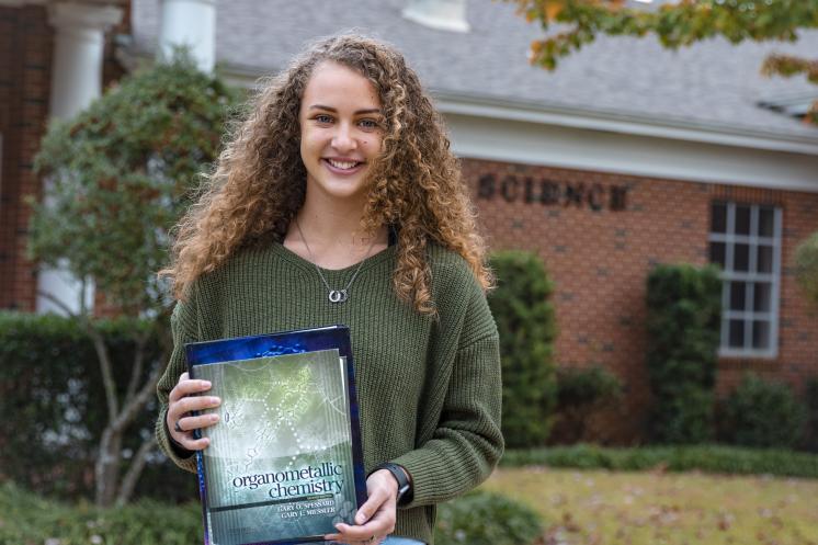 Chemistry Student with Textbook Chemistry Student with Textbook