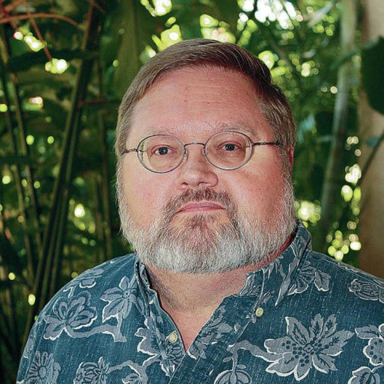 A man smiling at the camera